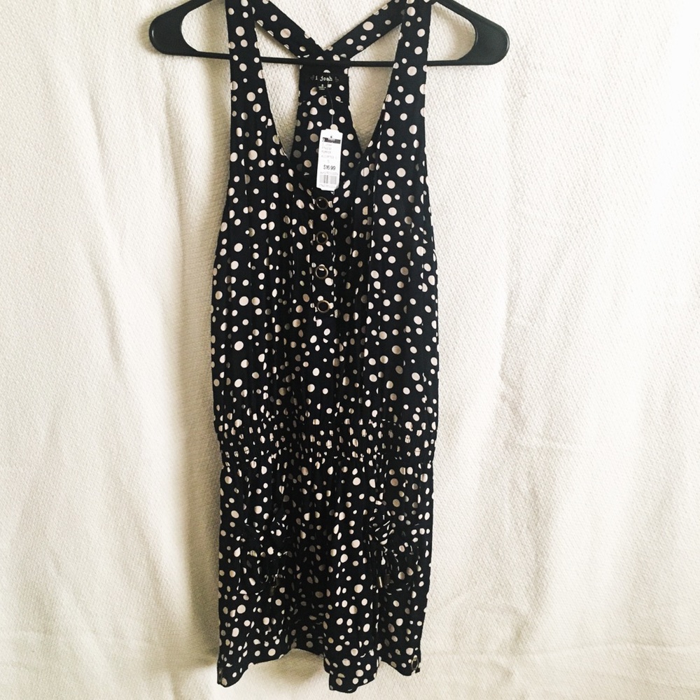 Polka dot romper with pockets, black and cream